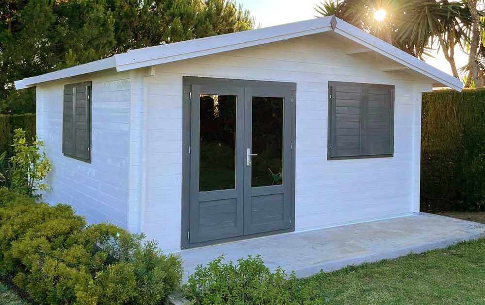 Garden log cabin room with shutters